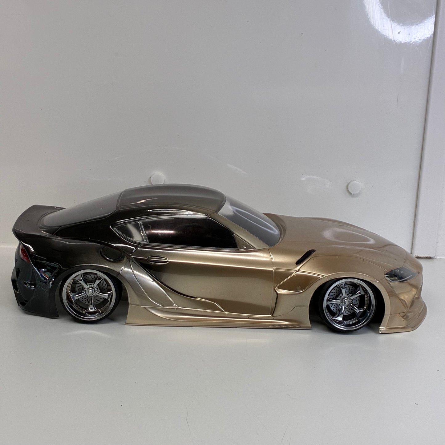 MST Toyota GR Supra (A90) Finished In An Elegant Champagne Gold/Bronze Metallic Paint