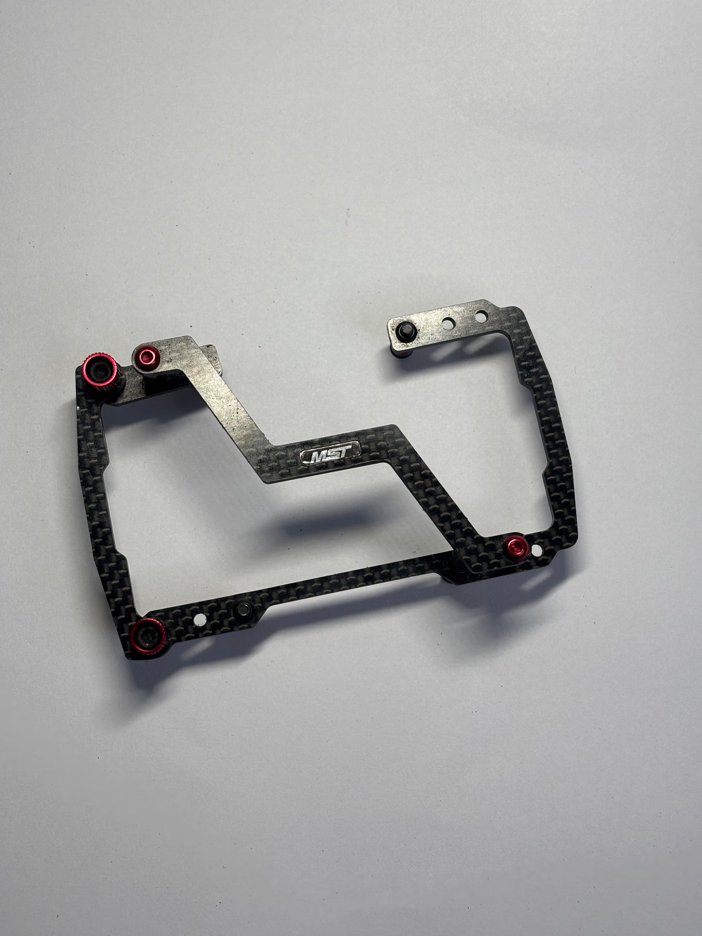 MST RMX 2.0 2.5 Carbon Alloy Battery Holder Mount