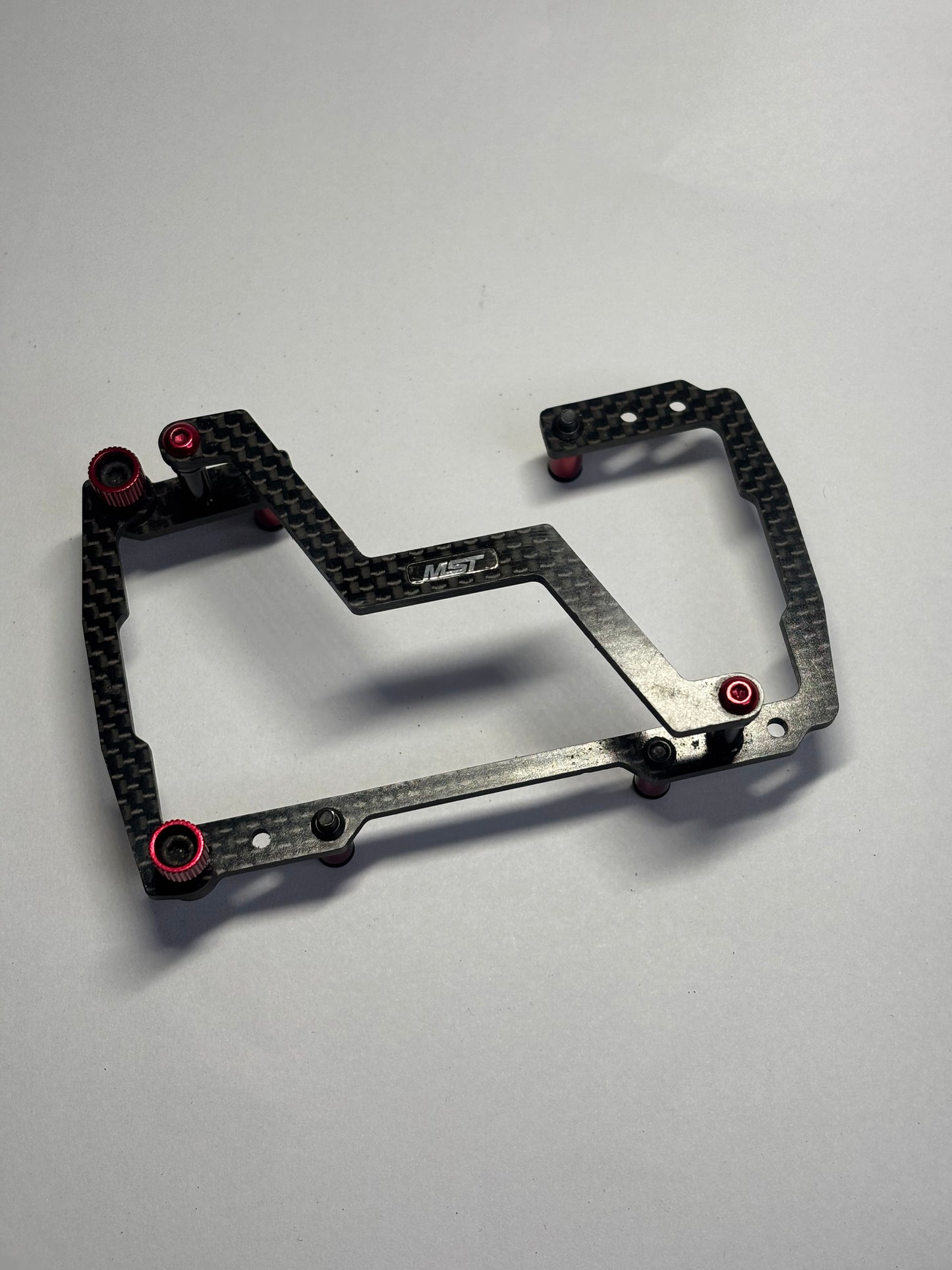 MST RMX 2.0 2.5 Carbon Alloy Battery Holder Mount