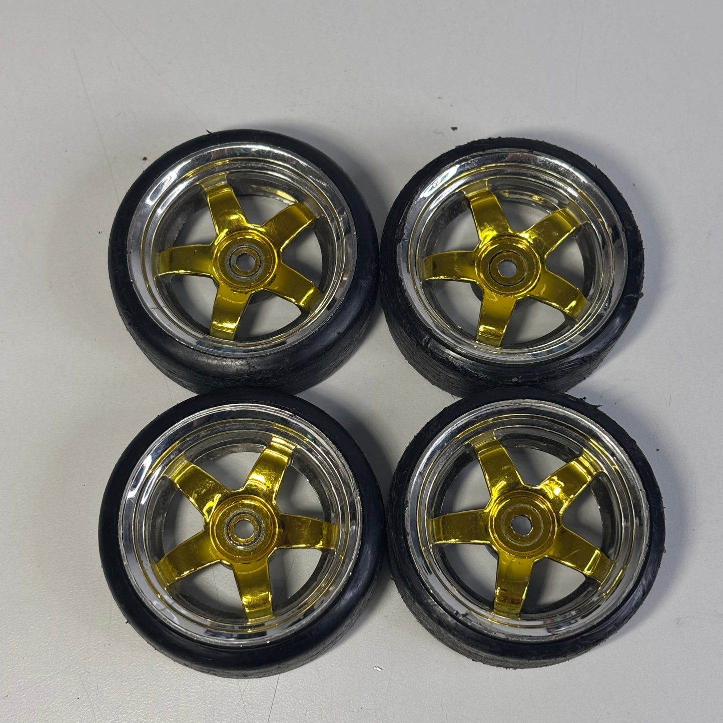Gold/Chrome Wheels And Tyres