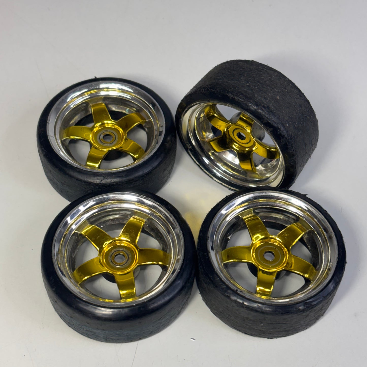 Gold/Chrome Wheels And Tyres