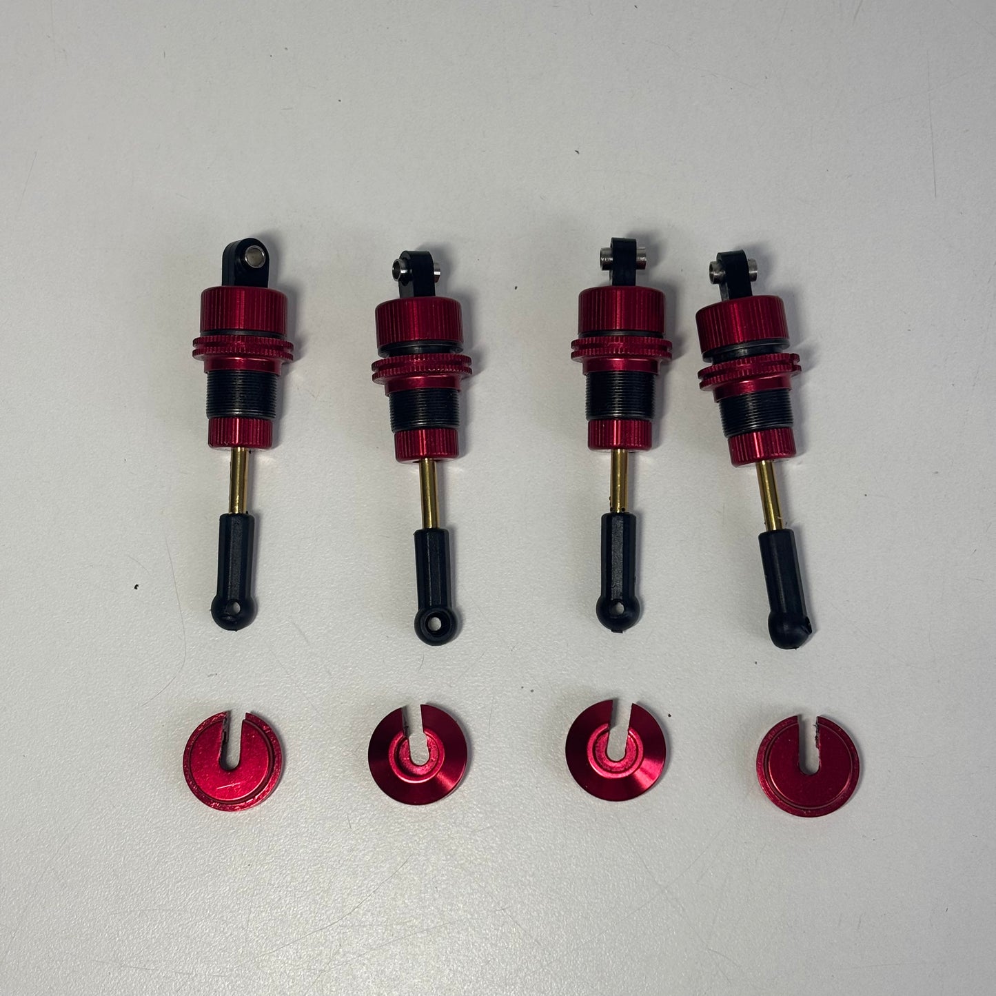 Red Alloy Shocks & Spring Retainers TR56?