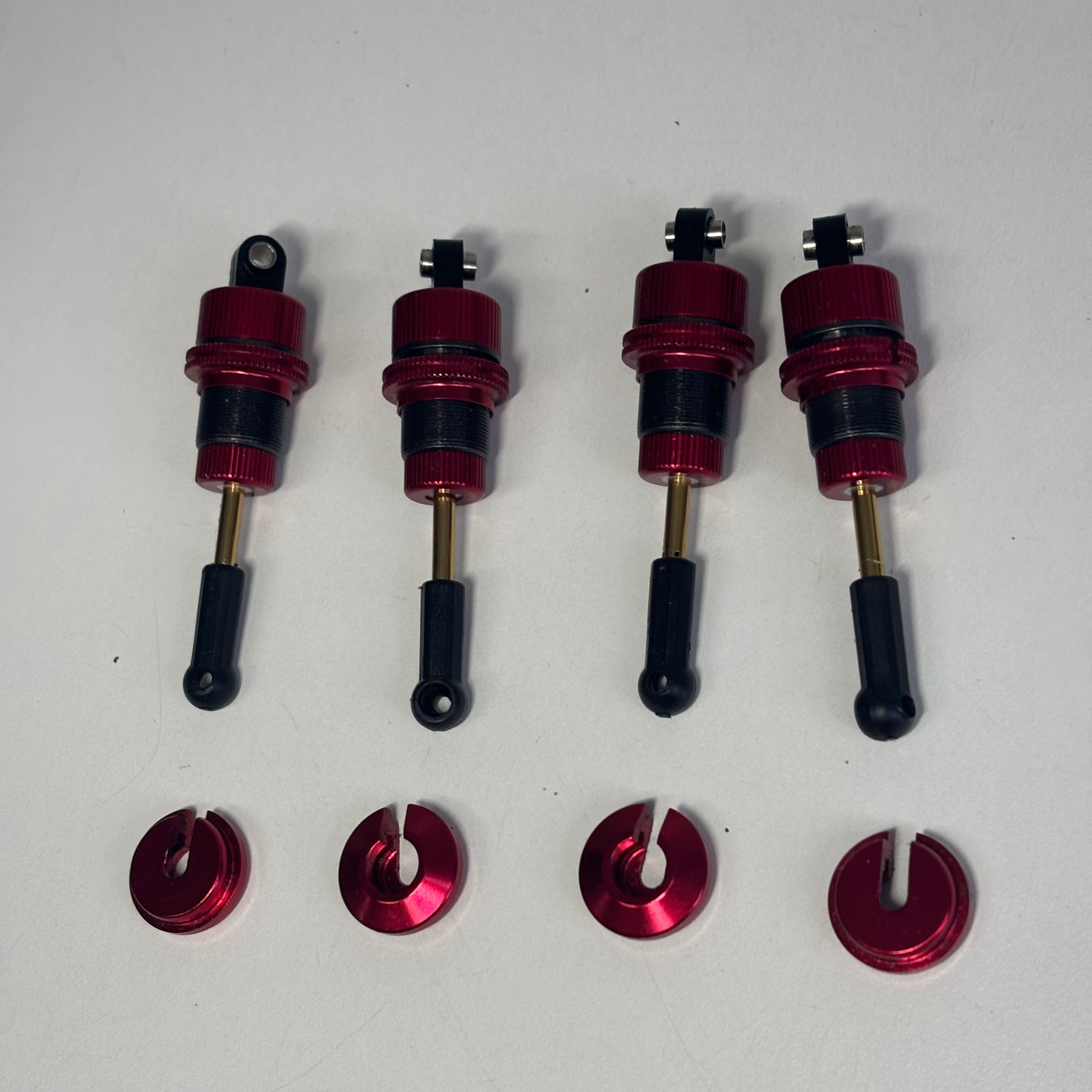 Red Alloy Shocks & Spring Retainers TR56?