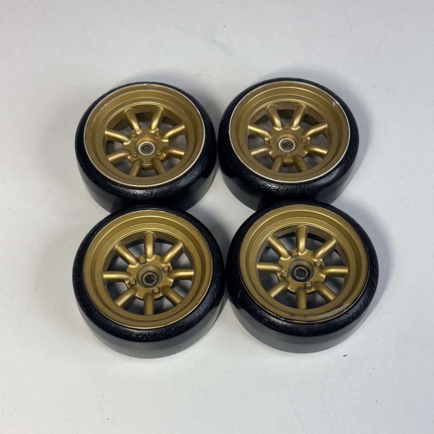 Gold 7mm Offset Wheeks With MST Silver Dot Tyres
