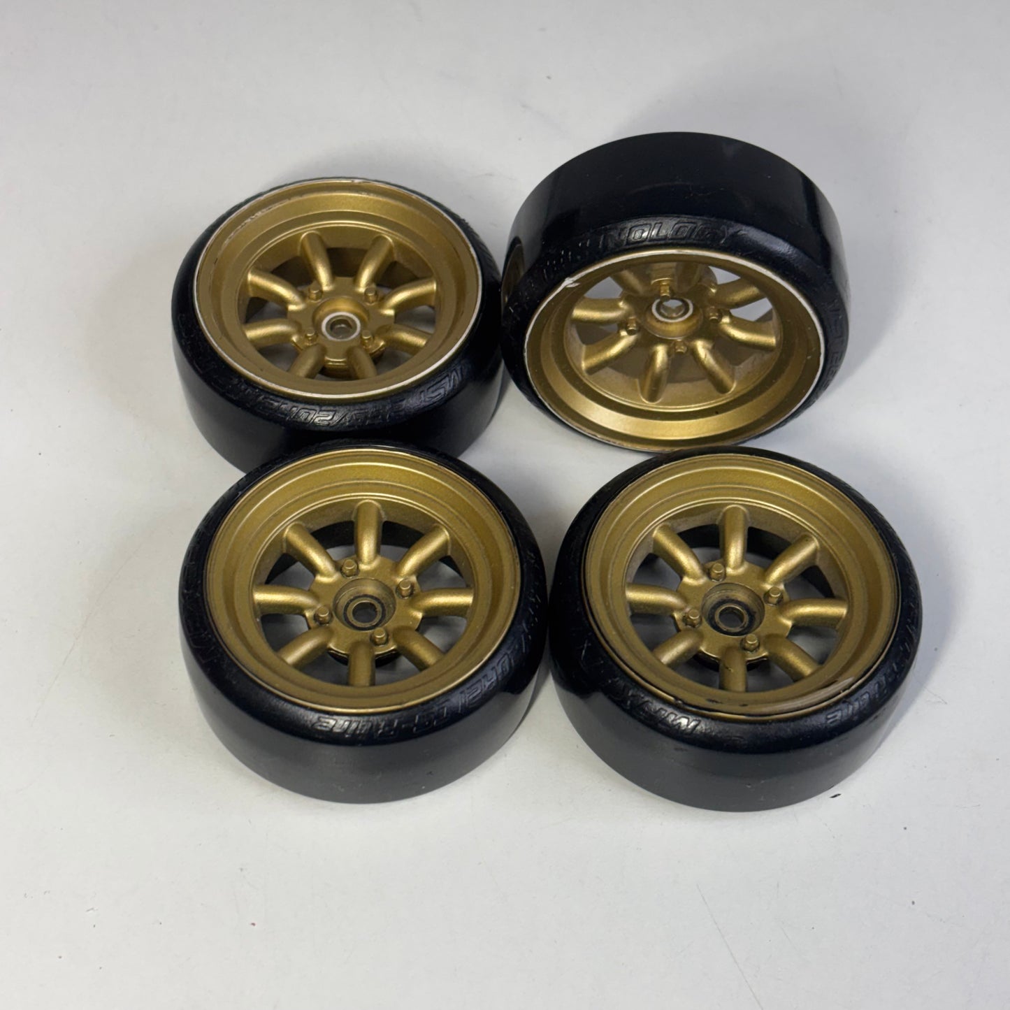 Gold 7mm Offset Wheeks With MST Silver Dot Tyres