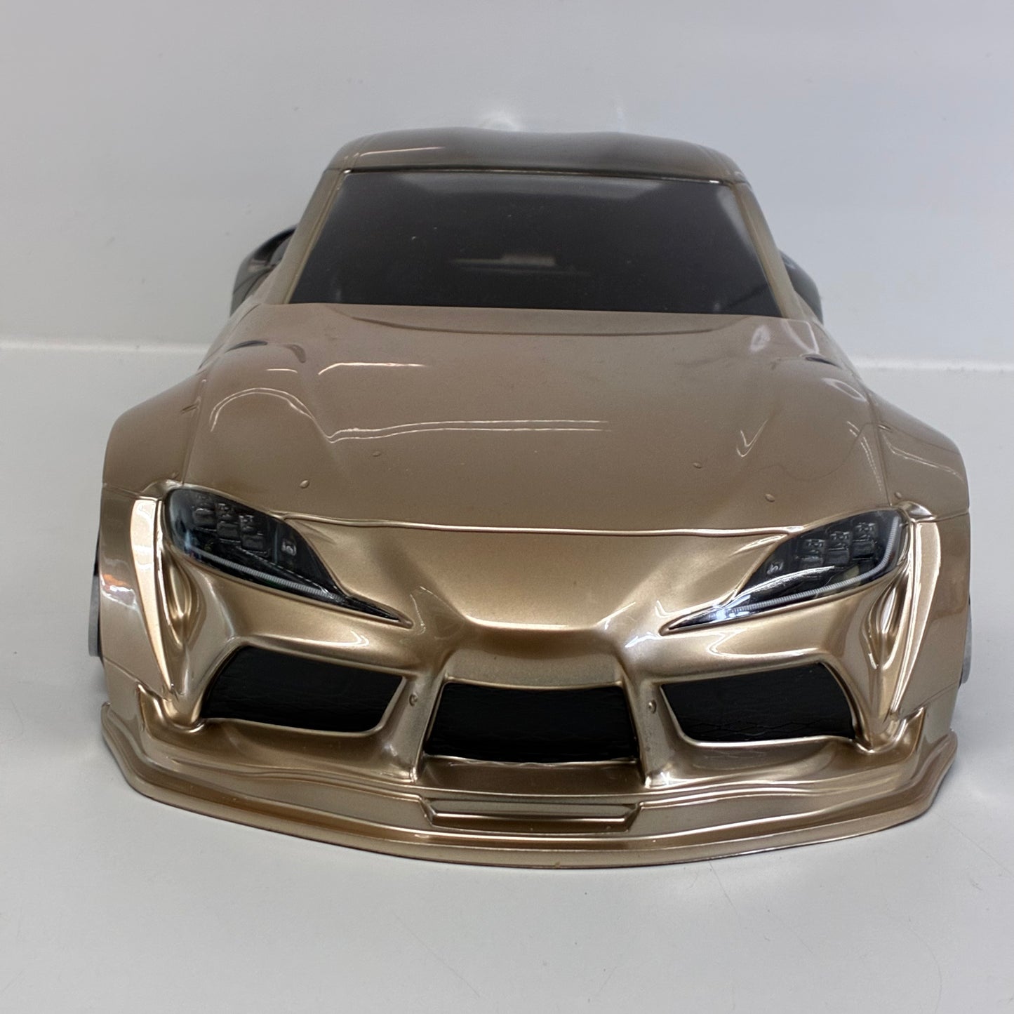 MST Toyota GR Supra (A90) Finished In An Elegant Champagne Gold/Bronze Metallic Paint