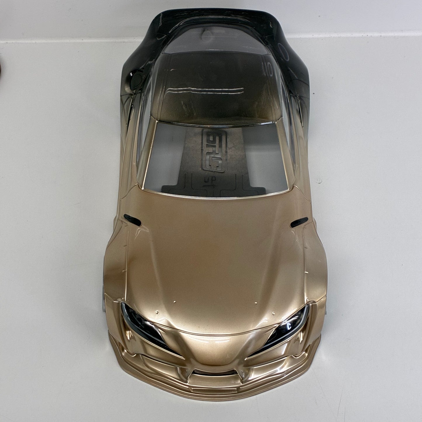 MST Toyota GR Supra (A90) Finished In An Elegant Champagne Gold/Bronze Metallic Paint