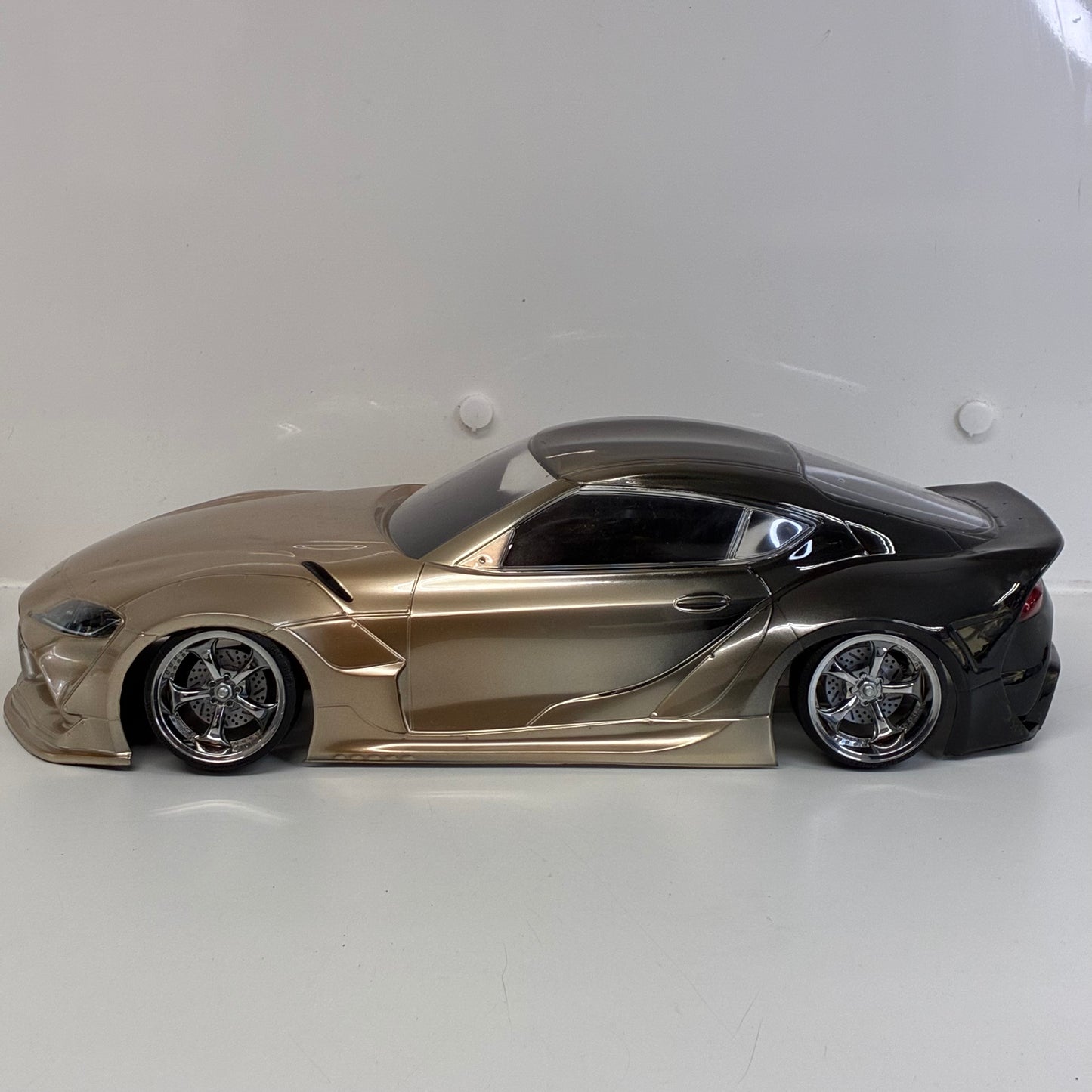 MST Toyota GR Supra (A90) Finished In An Elegant Champagne Gold/Bronze Metallic Paint